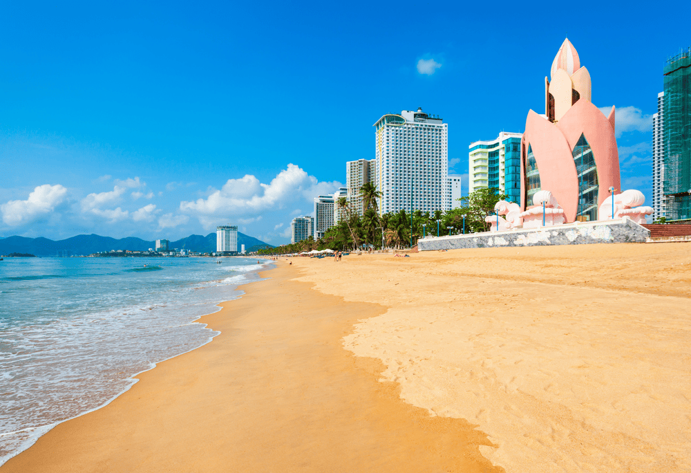 Witness the vibrant coastal life of Nha Trang as locals gather for morning exercises and seaside strolls (Source: Canva)
